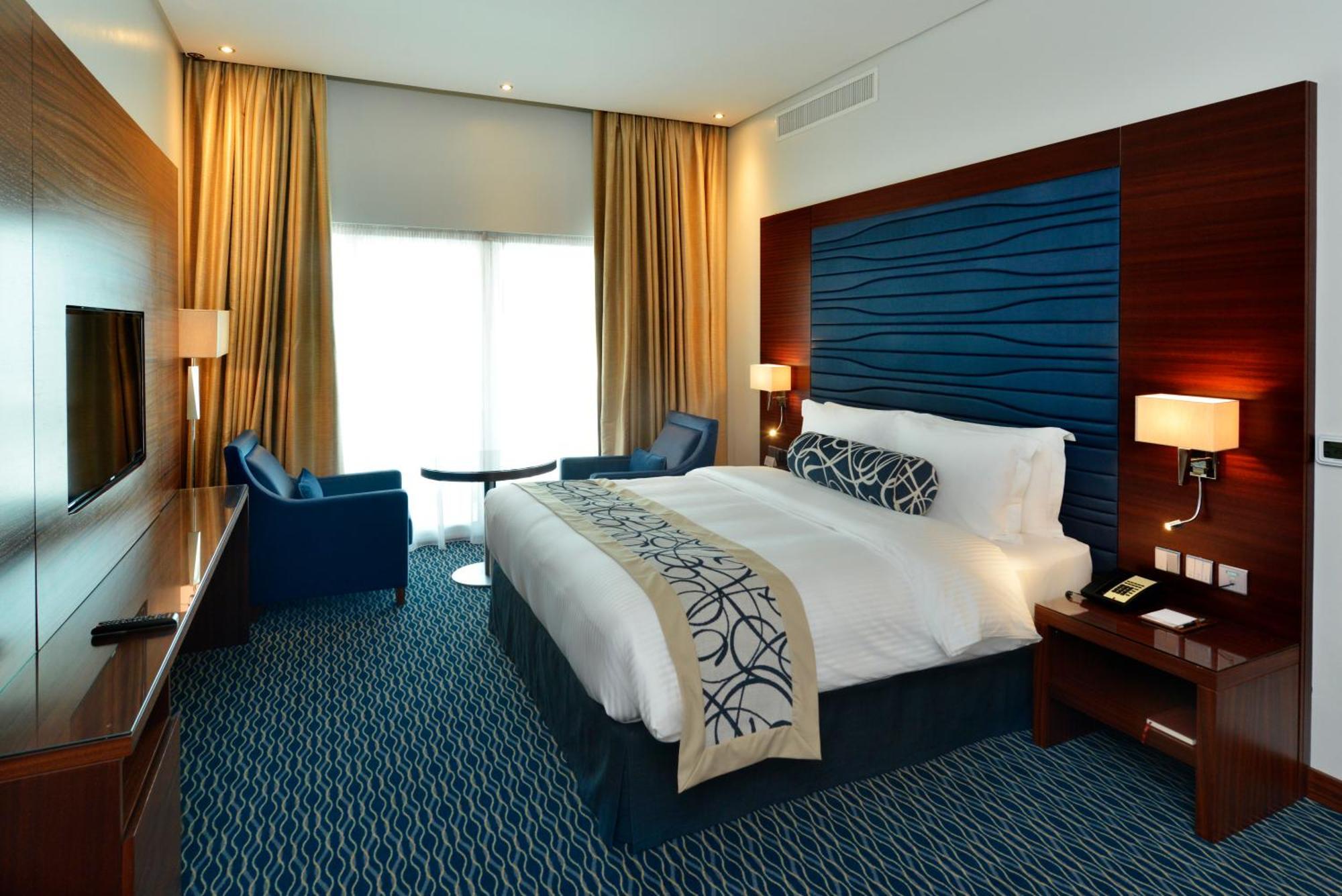 Ramada By Wyndham Manama City Centre Esterno foto