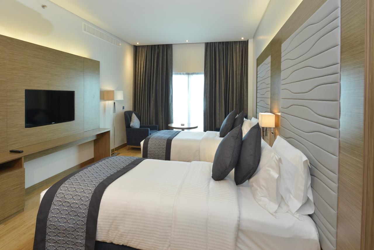 Ramada By Wyndham Manama City Centre Esterno foto